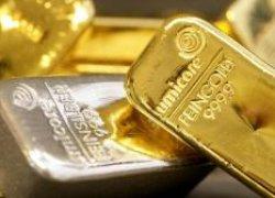 Золото в ожидании решений по Греции и Германии
